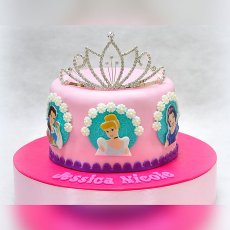 Send flowery design princess crown cake online by GiftJaipur in Rajasthan